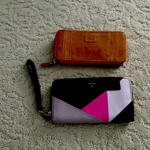 Two Fossil wallets. Leather.